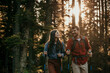 © La Famiglia - Young couple on vacation in the countryside, enjoy in summer. They walk through forest and explore nature