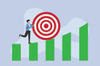 © Creativa Images - Pushing the target to the top of bar chart 2d flat vector illustration
