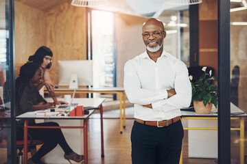 Poster - Portrait, confident and mature business man in office for career, pride and leadership experience. Glasses, smile and executive boss, manager and chief creative officer with arms crossed in startup
