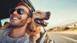 © stockdevil - Smiling man wearing sunglasses, with his Golden Retriever dog by his side, both leaning out of a car window at sunny day , seaside view
