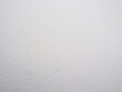 © papa papong - Grungy white watercolor paper backdrop with rough textured surface for design projects