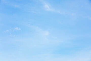 Wall Mural - fantastic soft white clouds against blue sky and copy space horizontal shape