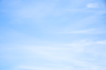 Wall Mural - fantastic soft white clouds against blue sky and copy space horizontal shape