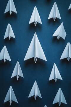 Group of paper plane in one direction 