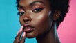 © Christopher - black woman with makeup and pink manicure