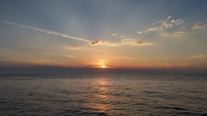 Wall Mural - Sunset over the cantabric sea at the Basque Country's coast.