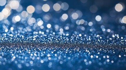 Poster - Silver glitter sparkles across a deep blue surface, creating a vibrant, festive atmosphere perfect for celebrations or special occasions