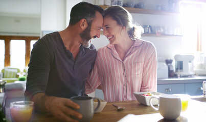 Poster - Happy couple, love or eating breakfast together with love, care or juice in meal in home kitchen. Romantic people, forehead or morning snack for bonding, support or food in healthy marriage for trust