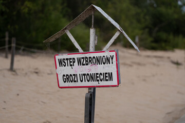 no entry, risk of drowning - information board on the Baltic Sea.