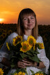 © Олег Мальшаков - Beautiful young girl in a white dress in sunflowers