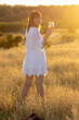 © Олег Мальшаков - Beautiful young girl with a glass of wine on a picnic