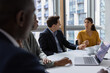 © ReeldealHD images - Successful businesswoman speaking in a board room meeting
