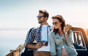 Wall Mural - Happy couple, nature and hug by car for road trip with camera for journey documentation, explore and bonding. Man, woman and together for scenic drive, travel photography and adventure with love.