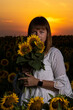 © Олег Мальшаков - Beautiful young girl in a white dress in sunflowers