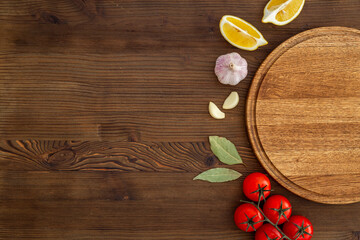 Wall Mural - Cooking layout with wooden cutting board and vegetables. Menu concept