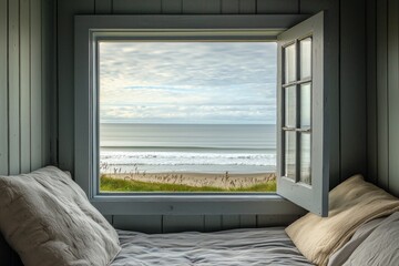 Wall Mural - A window in a small coastal cottage, overlooking a serene beach with gentle waves.