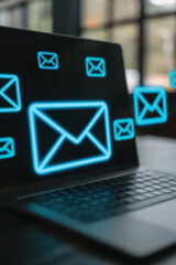 Aufkleber - A laptop with glowing email icons, representing online communication and digital messaging. Perfect for presentations on technology and business communications.