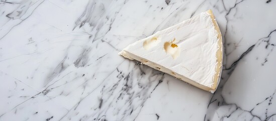 Wall Mural - White background with copy space image isolated presents a marble cheese slice