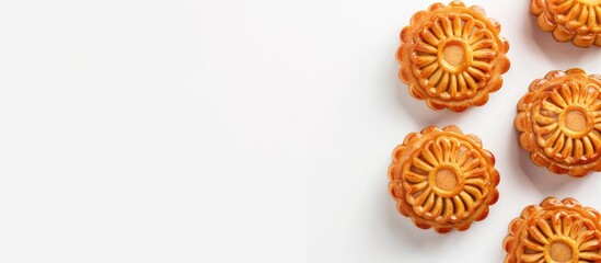 Poster - Top view of a mooncake on a white background with copy space image
