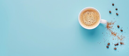 Poster - Top view of white cup with fresh coffee on blue background showcasing unhealthy food with copy space image