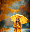 © MonkaLemonka - small 6  - 7 years old girl in yellow raincoat with yellow umbrella outside; smiled kid under the rainy weather; autumn/fall background; copy space