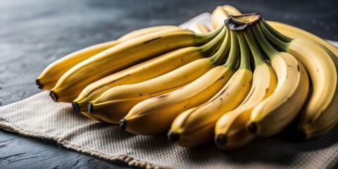 Wall Mural - Cluster of bananas on a rustic wooden table