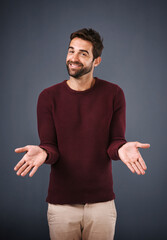 Poster - Business, portrait and palm of man for decision with choice, comparison or option with scale for balance. Employee, person and hand gesture for weighing opportunity and shrug on studio background