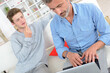 © auremar - man typing on the laptop