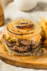 Canvas Print - Homemade Flying Dutchman Cheeseburger with an Onion Bun