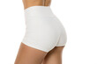© vladimirfloyd - cropped view of a young sporty woman posing in tight white sexy shorts on a white background in the studio. Side view.