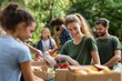 © fotofabrika - Volunteers Organizing Food Donations in a Local Park During Sunny Afternoon