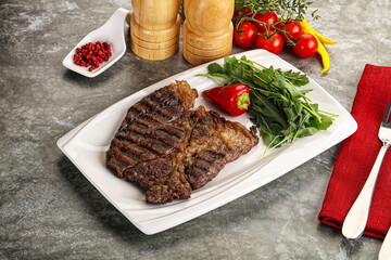 Wall Mural - Grilled chuck roll steak with arugula