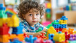 © Victoria Andrievska - Child playing with blocks