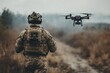 © Алена Ваторина - Soldier operating drone in combat zone