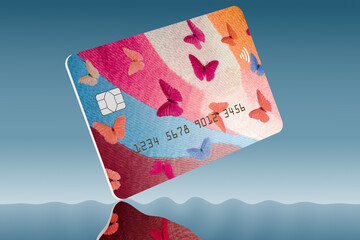 Poster - Butterflies decorate a generic credit card or debit card in a generative AI image about banking and finance.