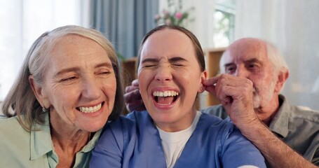 Wall Mural - Selfie, senior couple and happy nurse in home for community care or medical support. Portrait, man and face of funny woman with caregiver for geriatric health, kiss and pinch ear for photo together