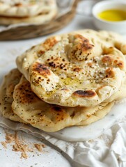 flat box of soft and delicious naan with garlic, olive oil and herbs on top, butter garlic naan, flatbread, Indian food, kulcha	