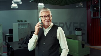Poster - professional man engaged in business conversation inside modern office space during daytime