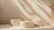 © Sudaporn - Three beige light podium for cosmetic product presentation : Generative AI