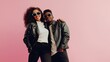 © The Little Hut - Full length of stylish multiethnic couple in sunglasses posing on pink background : Generative AI