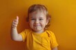 © INFAYUFA - Little Girl Gives a Thumbs Up