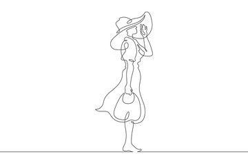 Poster - Woman on the beach in a big hat. Girl in a summer cape on the seashore.One continuous line. Line art. Minimum one line. White background. One line drawing.