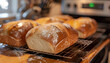 © Oleksiy - Freshly baked bread cooling on a rack, Monday morning, homey and comforting