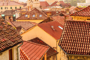 Wall Mural - cityscape with orange vintage tile roofs in traditional venetian style, old town architecture