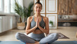 © Oleksiy - Beautiful young woman practicing Padmasana on yoga mat at home. Lotus pose