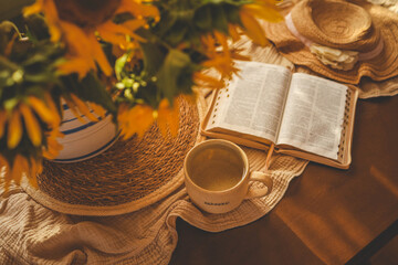 Wall Mural - An open Bible in a cozy home atmosphere