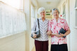 © Penn/peopleimages.com - Walking, handbag and portrait of senior women in nursing home ready for outing, leaving and going out. Retirement, friends and elderly people with purse in corridor for bonding, relationship and love