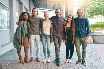 Leinwandbilder - Portrait, group and students at university outdoor for walking to school, commute and embrace for education travel. People, support and relax for studying, learning and road path of campus morning