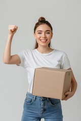 Poster - Happy woman holding cardboard box