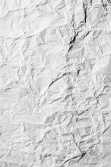 Aufkleber - A close-up view of a crumpled piece of paper with creases and folds